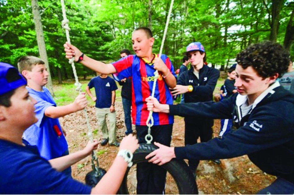 JORI campers try out the ropes course.